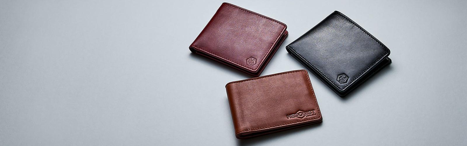 Men's Leather Bifold Wallets crafted from full-grain leather, offering classic functionality.