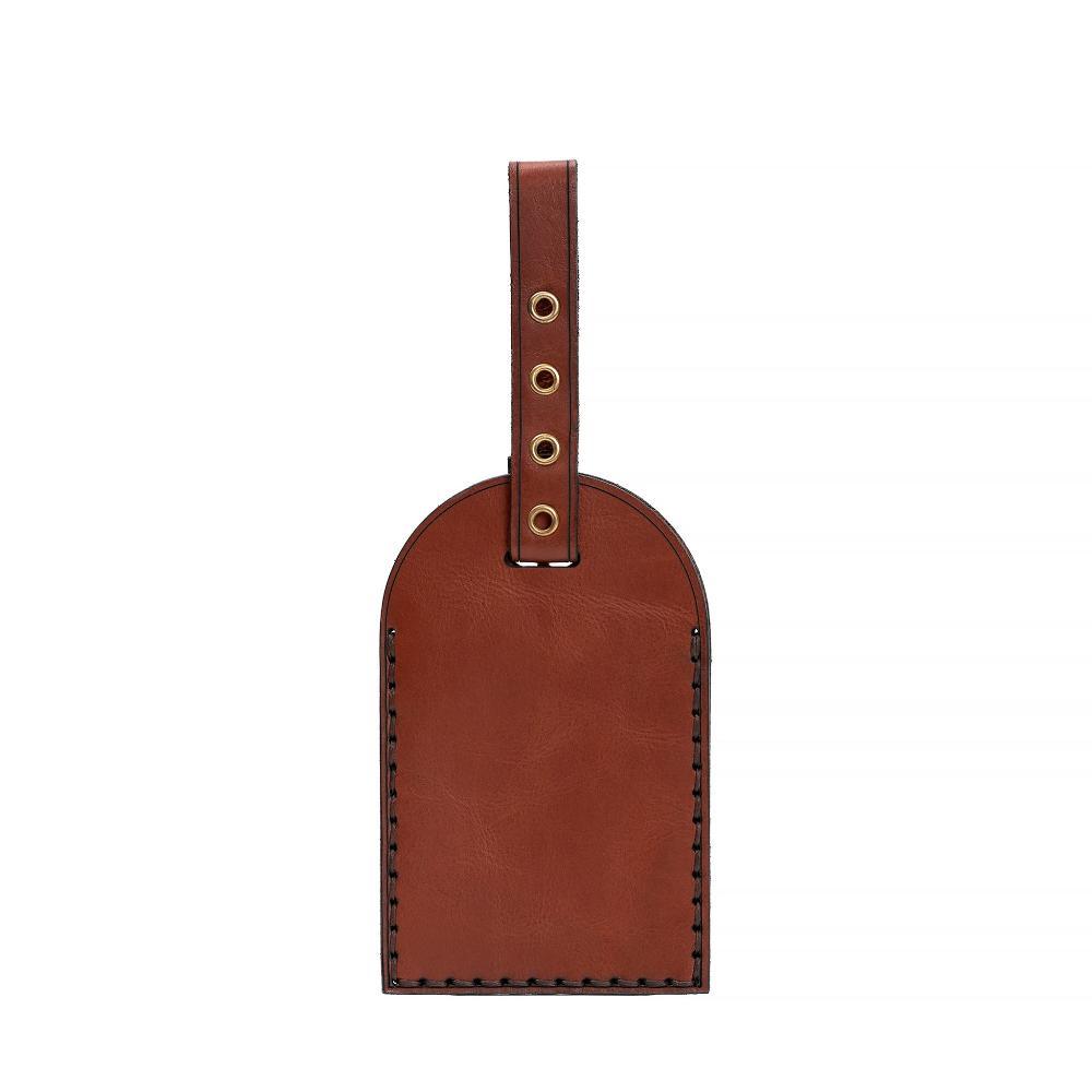 Hedonist Chicago light mahogany luggage tag in light mahogany, with strap, full grain leather, angled view