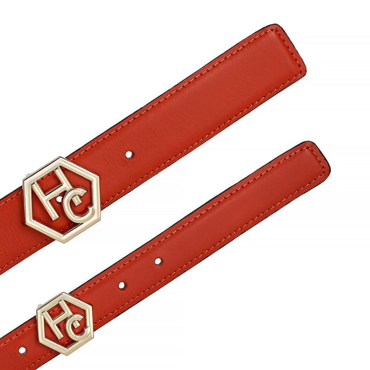 Buckle close-up on women's reversible design leather belt - red - Hedonist Chicago