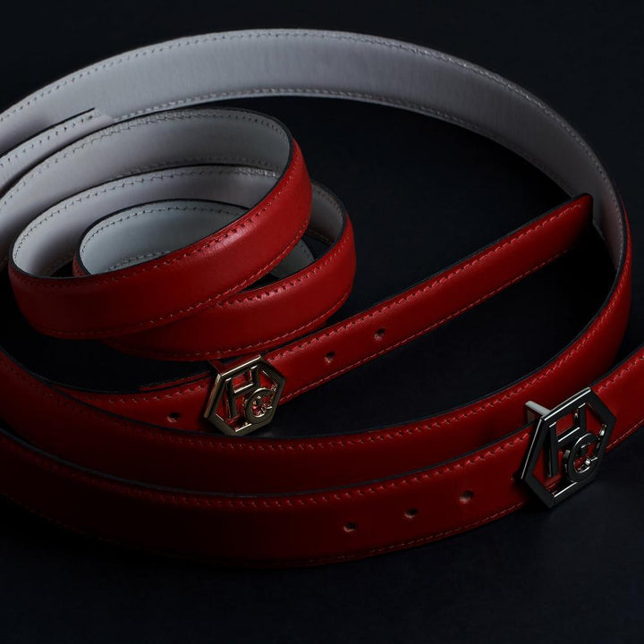 Side view on women's signature detail belt - red - Hedonist Chicago - close-up view