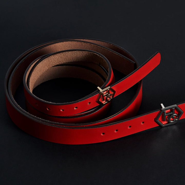 Tip detail on women's seamless edge leather belt - red - Hedonist Chicago - close-up view
