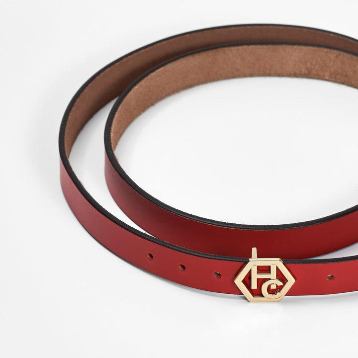 Buckle close-up on women's seamless edge leather belt - red - Hedonist Chicago - close-up view