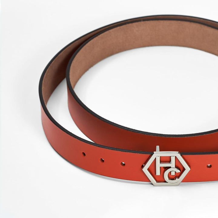 Buckle close-up on women's seamless edge leather belt - red - Hedonist Chicago - close-up view