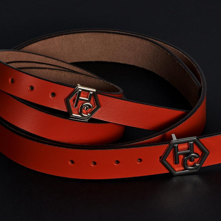 Side view on women's seamless edge leather belt - red - Hedonist Chicago - close-up view