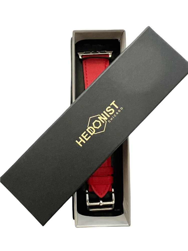 Red Apple Watch band packaged in Hedonist Chicago gift box