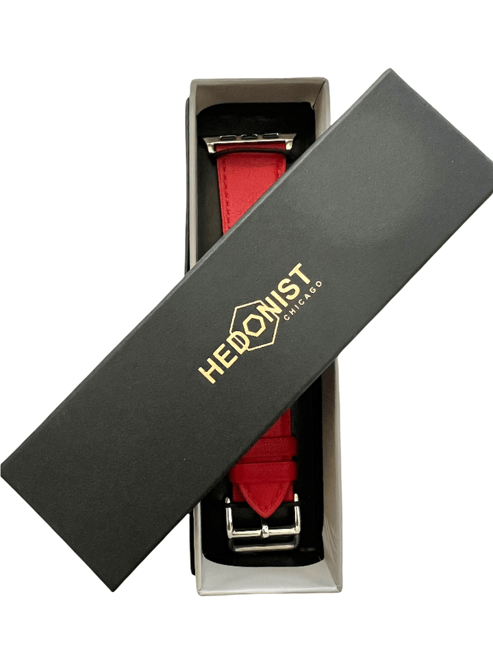 Red Apple Watch band packaged in Hedonist Chicago gift box
