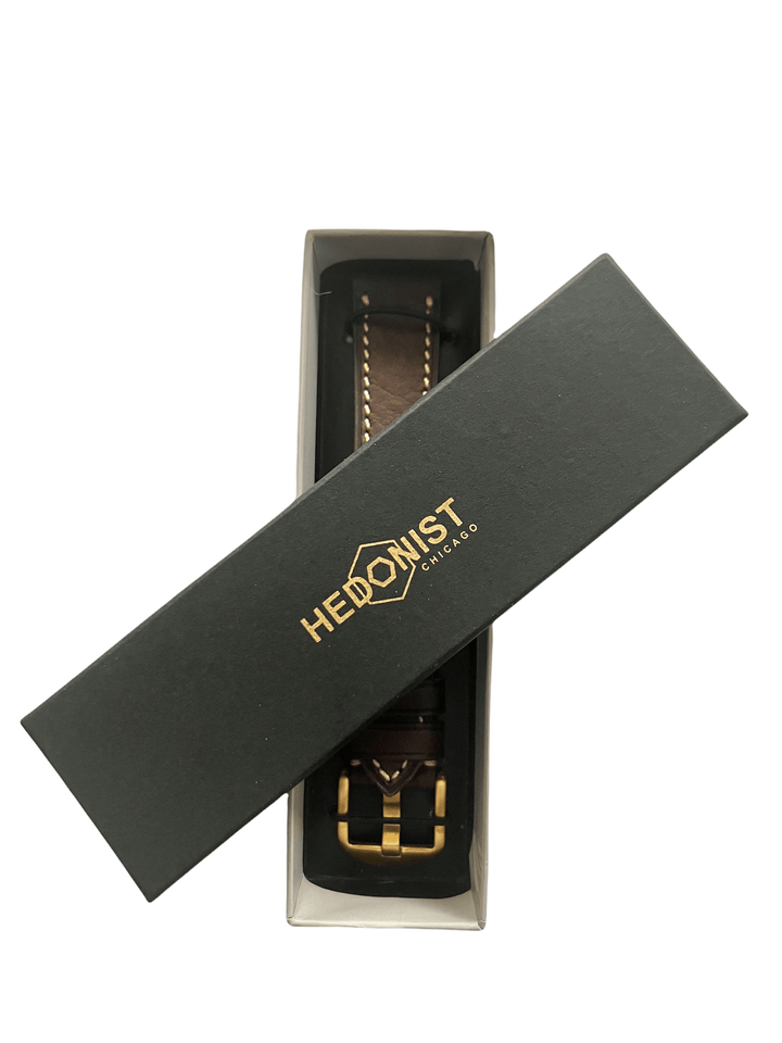 Pink Apple Watch band packaged in Hedonist Chicago gift box