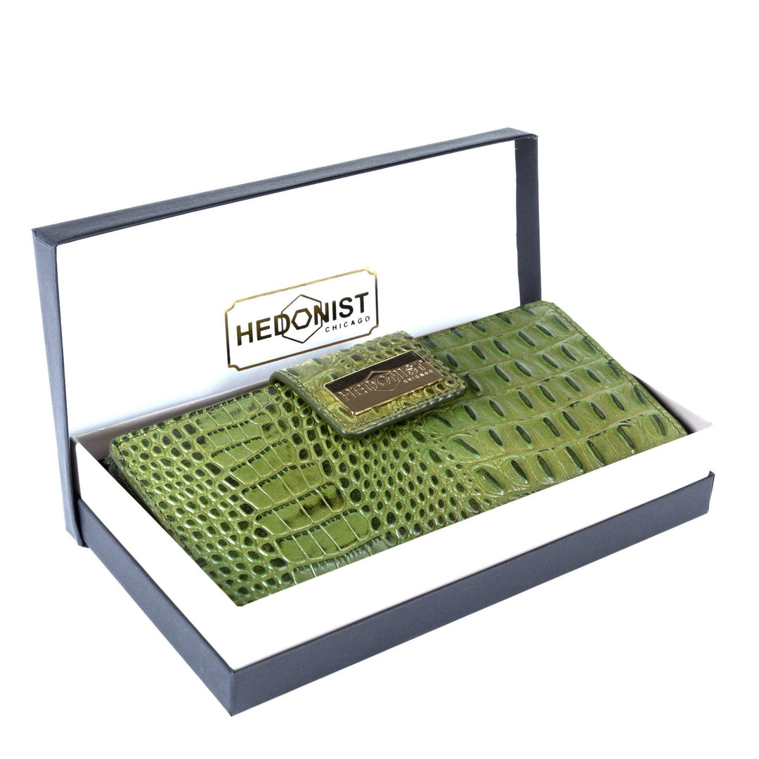 Green croc-embossed leather long travel wallet for women in Hedonist Chicago branded gift box