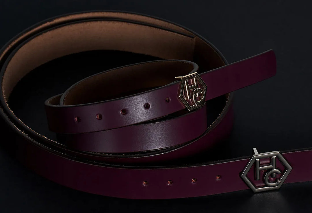 Women's leather belt in full grain leather showing quality construction with metal buckle and proper edge finishing for everyday wear