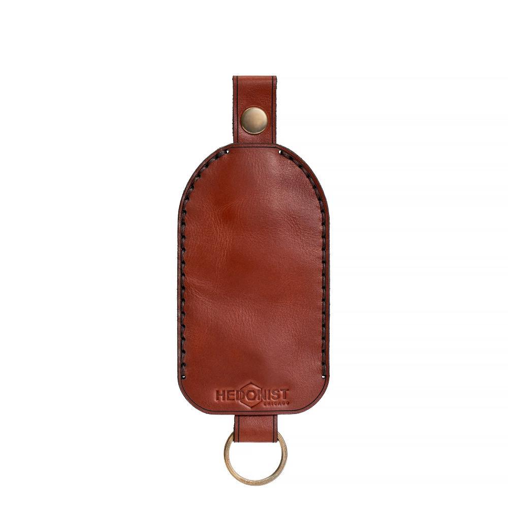 Handmade leather key chain showing hand-stitched construction with brass hardware and full grain leather for durable daily use