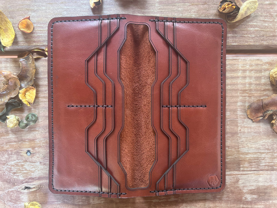 Handmade leather card holder showing hand-stitched construction with precise card pockets and full grain leather for daily use