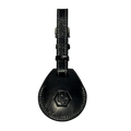 A black leather AirTag holder with a teardrop-shaped body and a matching strap, featuring an embossed 'HC' logo 
