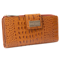 Large brown embossed leather travel wallet closed, front flap with gold-tone Hedonist Chicago plaque