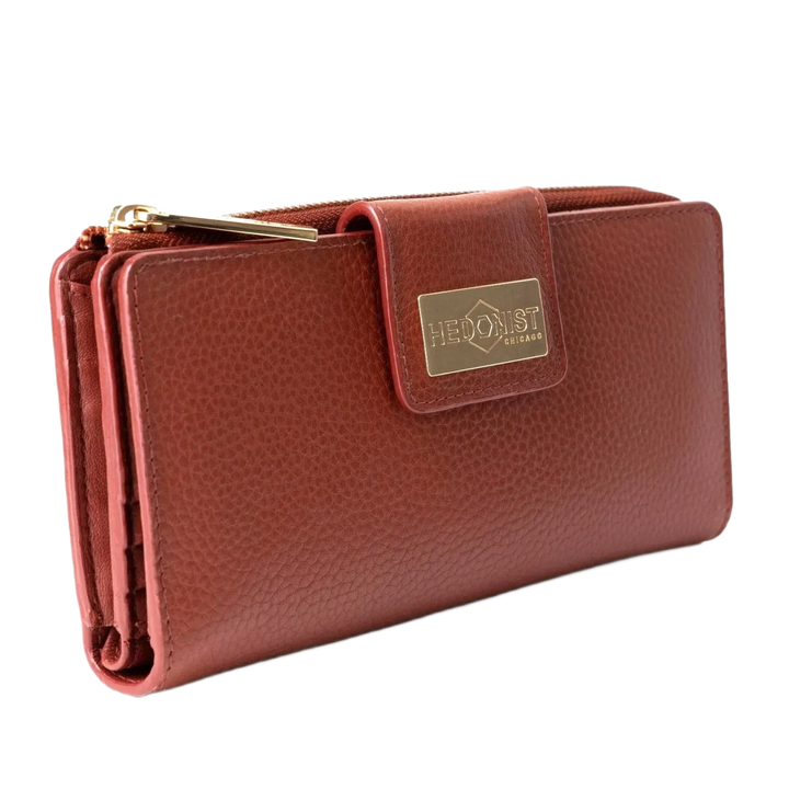Large red pebbled leather travel wallet front view on white background