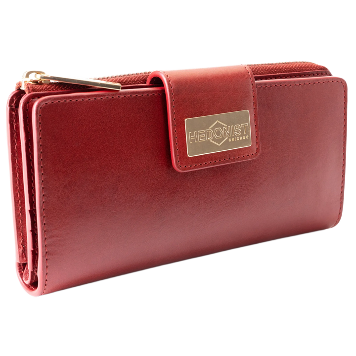 Long red leather wallet closed, front flap with gold-tone Hedonist Chicago plaque