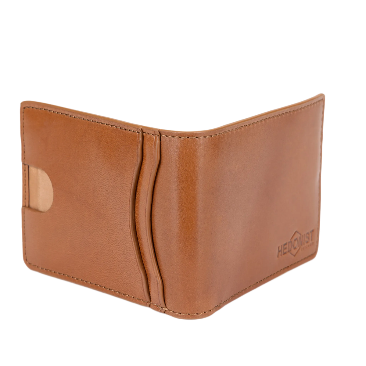 A tan leather bi-fold wallet shown open against a plain white background, featuring card slots, a side pocket, and an embossed logo on the lower right.