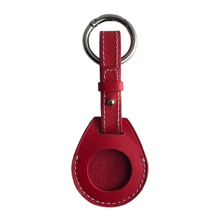A red leather AirTag Holder with a teardrop-shaped tag, white contrast stitching, and a silver metal key ring