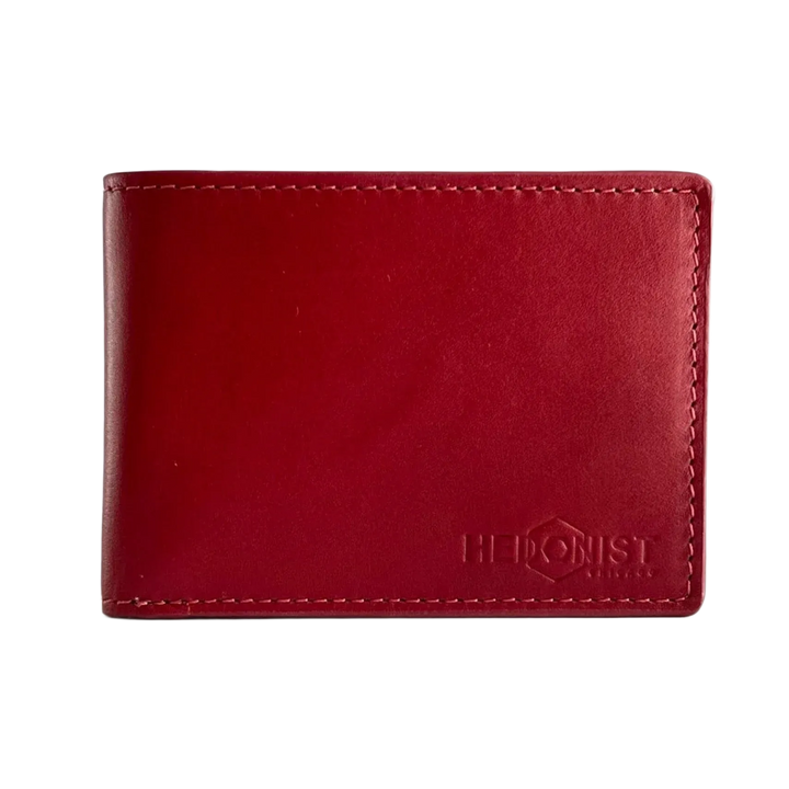 A red leather bifold wallet with visible stitching and an embossed logo reading 'HEDONIST Chicago' on the lower right.