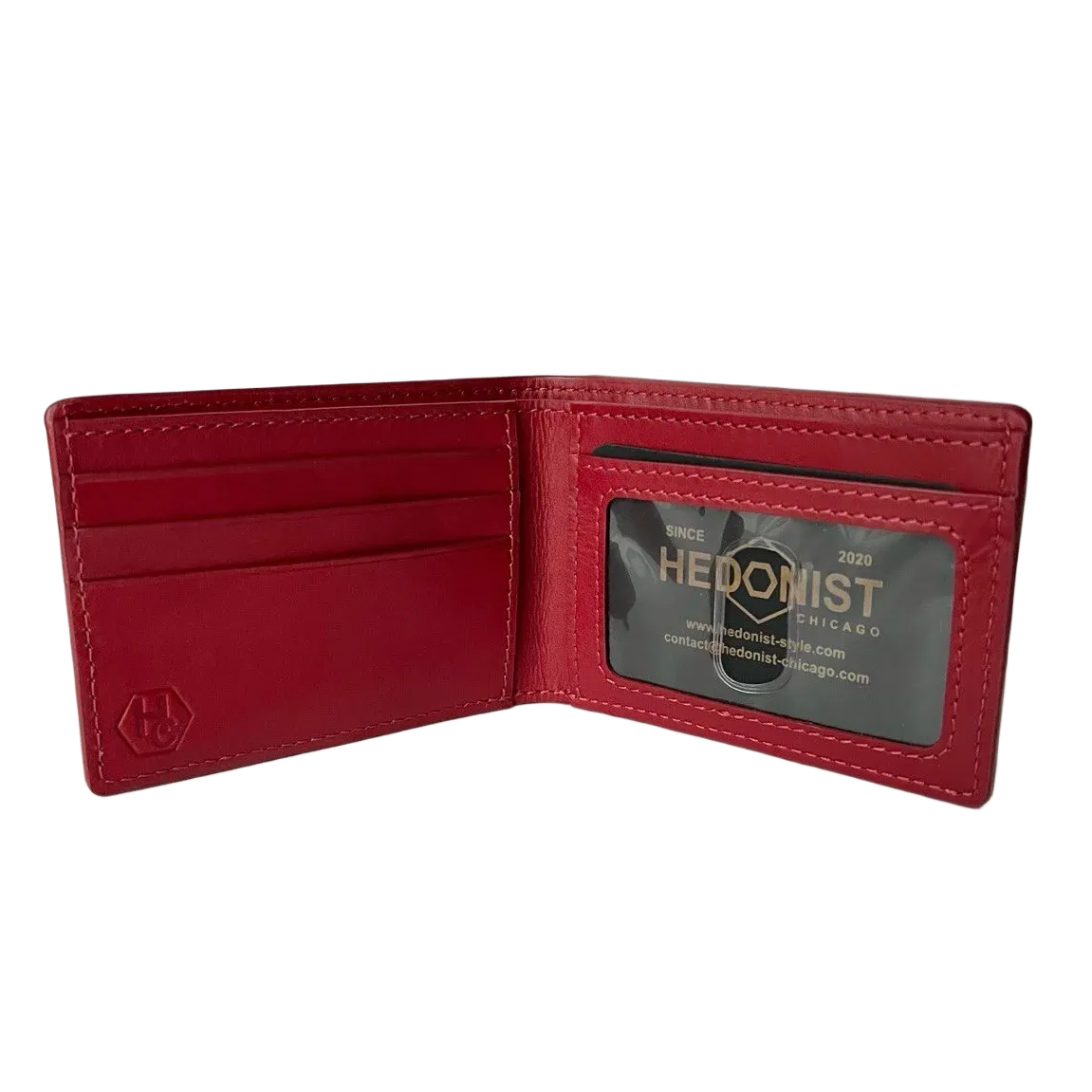 A red leather bifold wallet shown open, displaying its interior card slots and an ID window with a custom 'HEDONIST' business card insert. A debossed hexagonal logo is visible on the lower left interior corner.