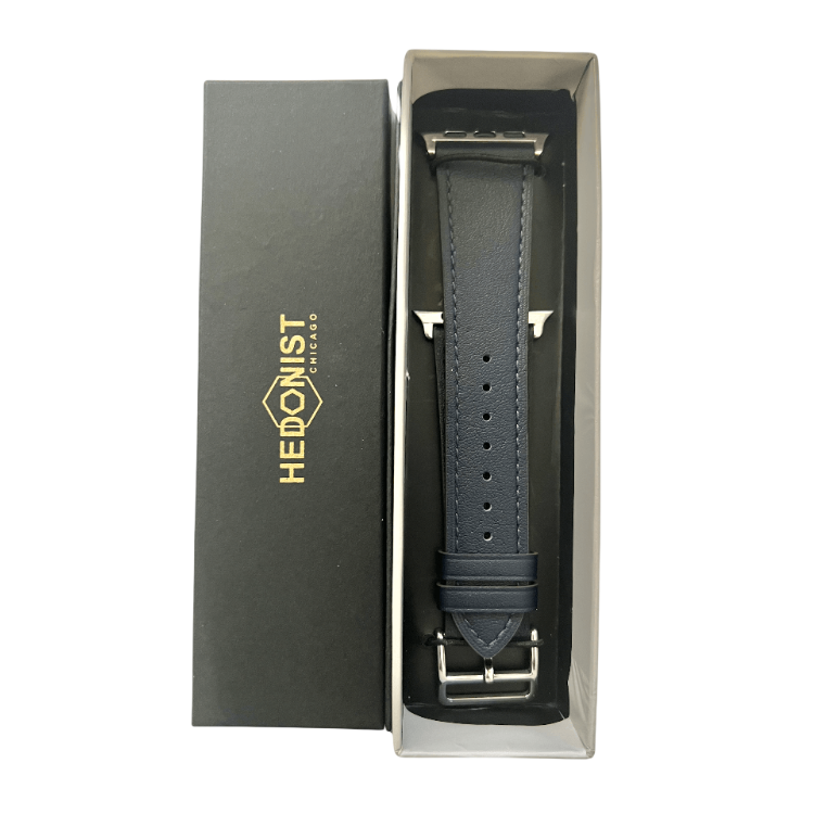 Black leather Apple Watch band, packaging close-up