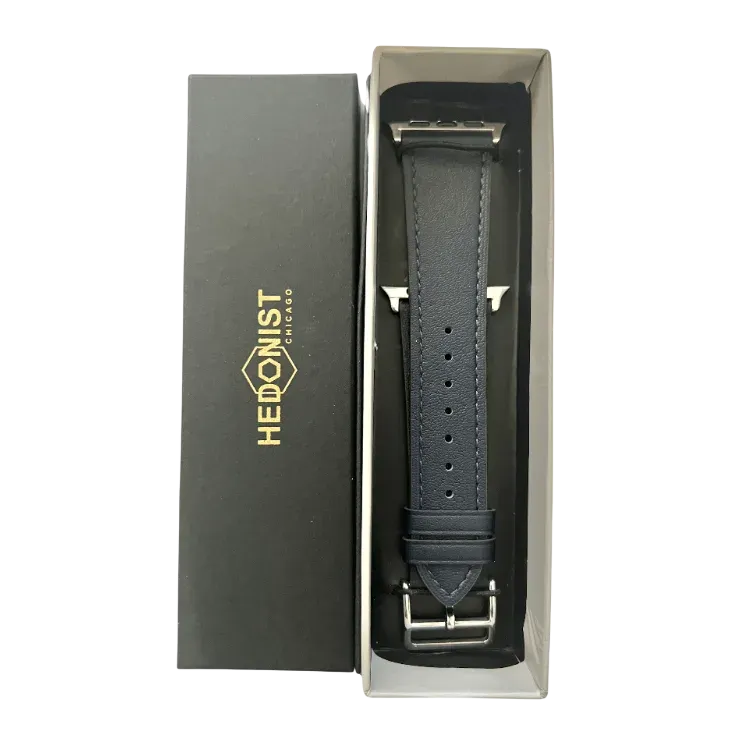 Black leather Apple Watch band, packaging close-up