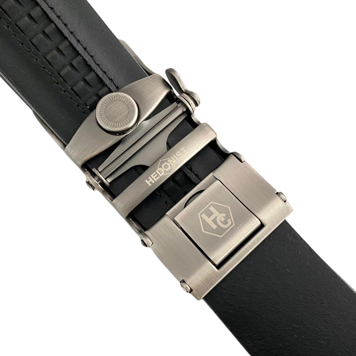 Black croco leather ratchet belt with gunmetal buckle, hardware close-up, textured leather