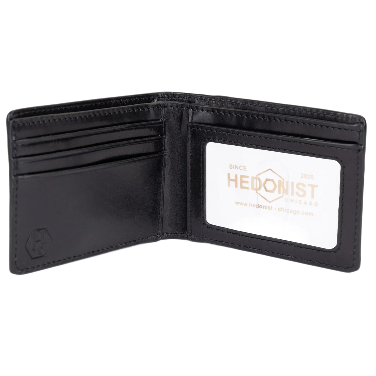 A black leather bi-fold wallet shown open, featuring multiple card slots on the left and an ID window on the right with a white insert card displaying the brand name 'HEDONIST'.