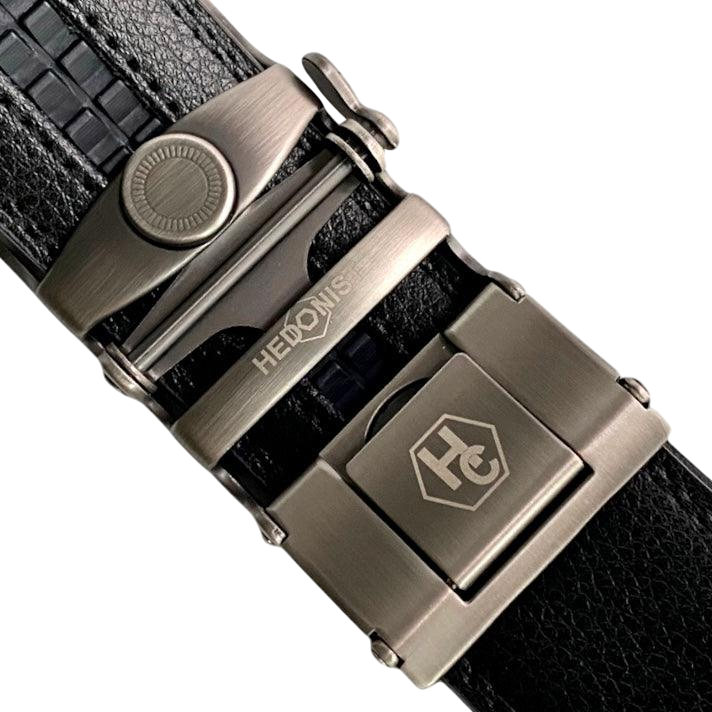 Black leather casual ratchet belt with gunmetal buckle, buckle close-up