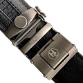 Black leather casual ratchet belt with gunmetal buckle, buckle close-up