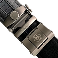 Black leather casual ratchet belt with gunmetal buckle, buckle close-up