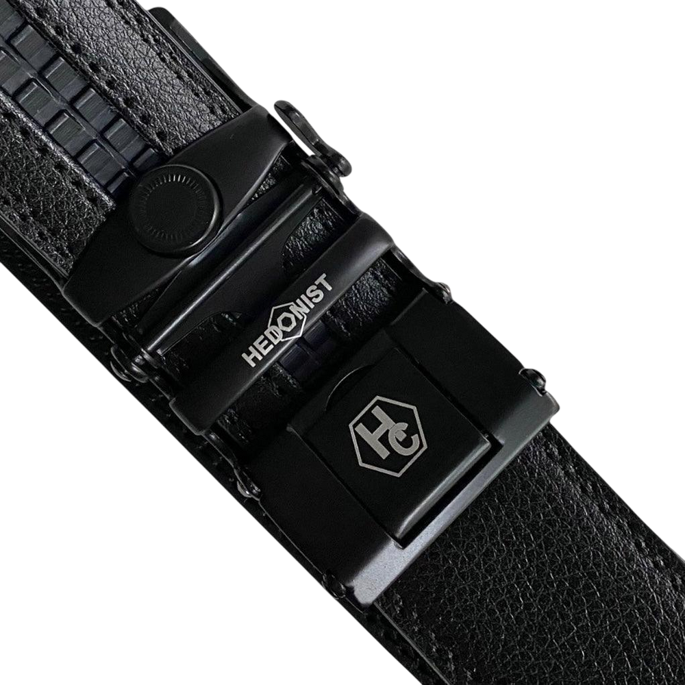 Black leather ratchet belt with black buckle, hardware close-up