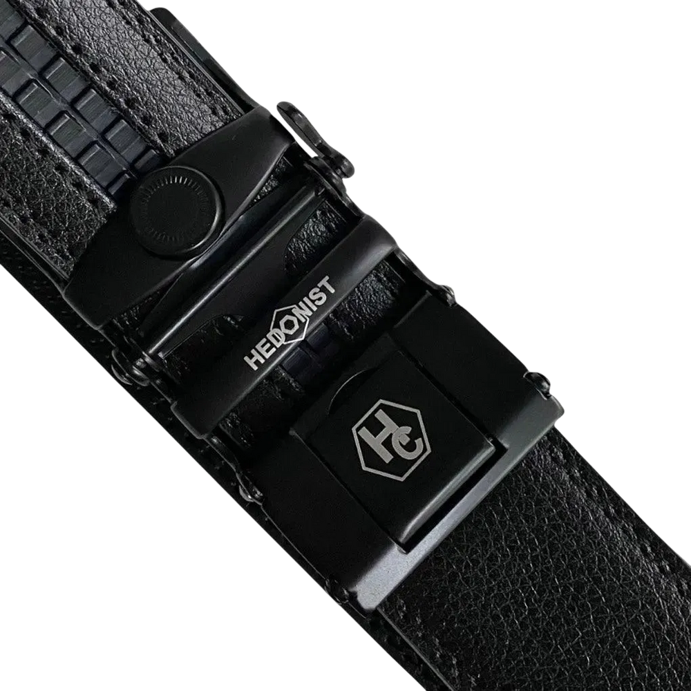 Black leather ratchet belt with black buckle, hardware close-up