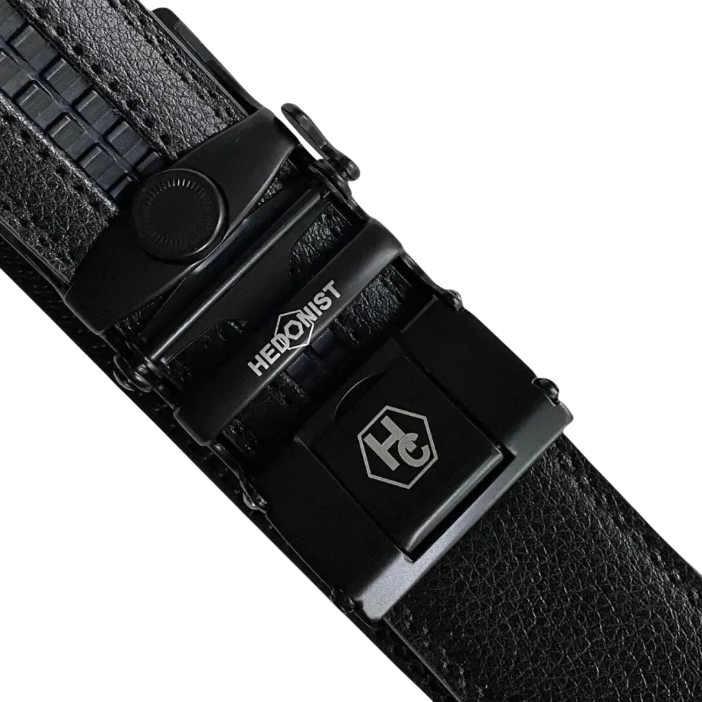 Black leather ratchet belt with black buckle, hardware close-up