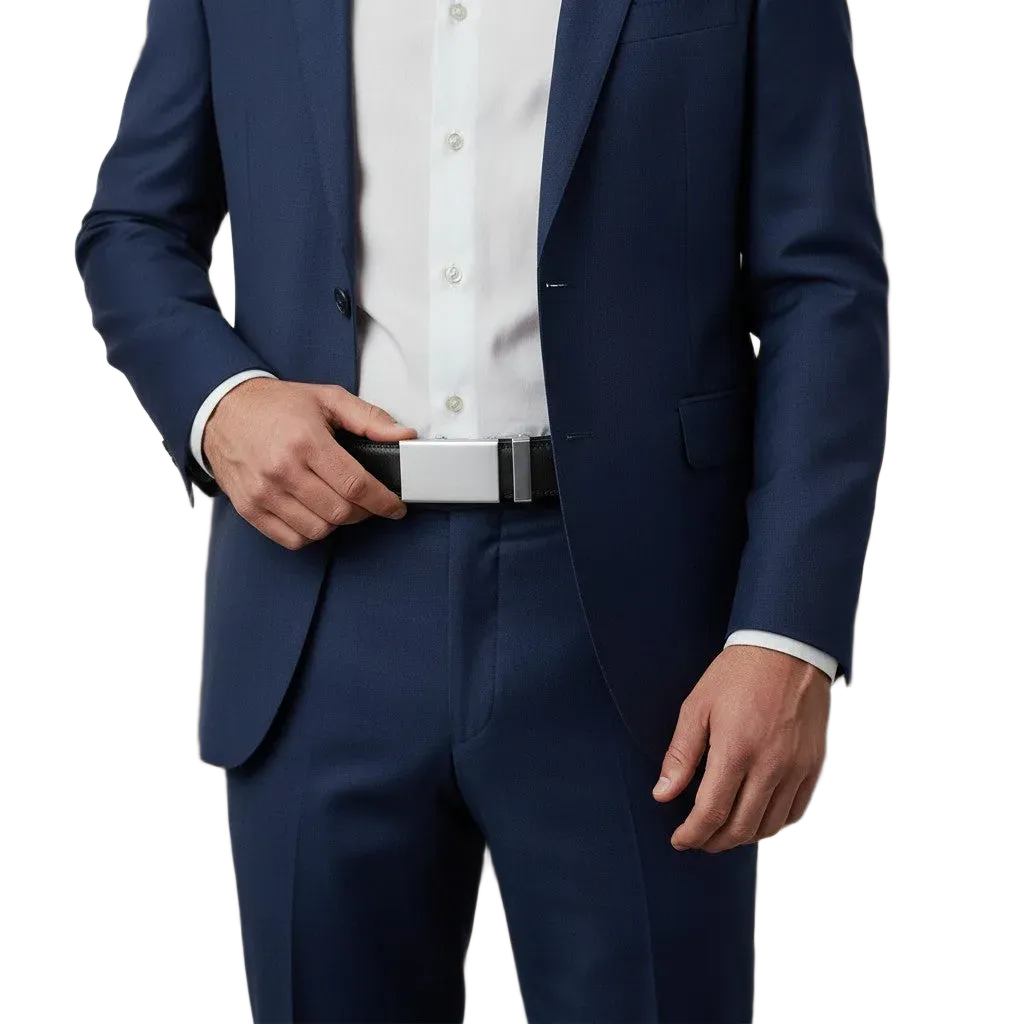 Person wearing a black leather belt with a blurred indoor background