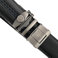 Black leather ratchet belt with gunmetal buckle, hardware close-up