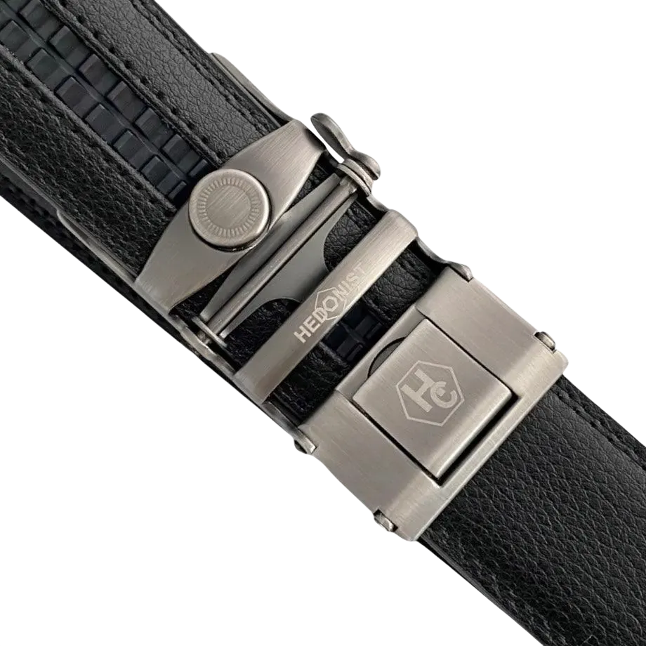 Black leather ratchet belt with gunmetal buckle, hardware close-up