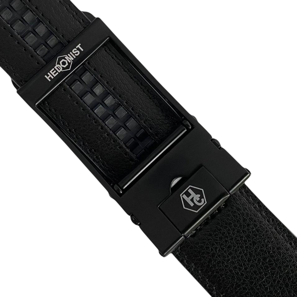 Black leather ratchet belt with black hollow frame buckle, hardware close-up