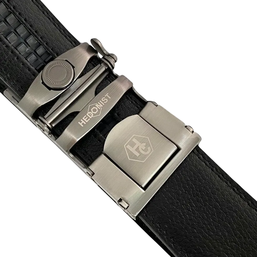 Black leather ratchet belt with metal plate buckle, hardware close-up