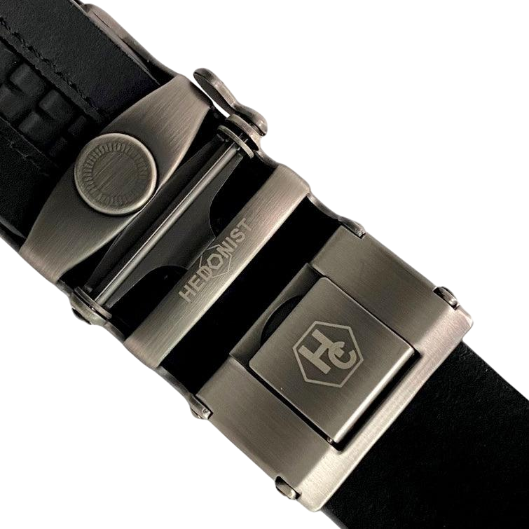 Black leather ratchet belt with open frame buckle, hardware close-up