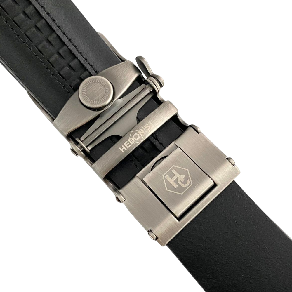 Black leather ratchet belt with oval metal buckle, hardware close-up