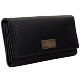 Black leather trifold wallet for women closed, gold-tone Hedonist Chicago plaque on front