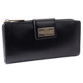 Black leather travel wallet closed, front flap with gold-tone Hedonist Chicago plaque