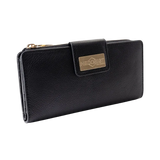 Black pebbled leather travel wallet for women closed, front view with card slot edge visible