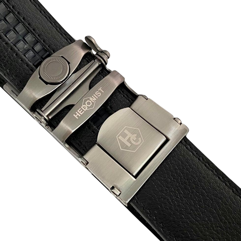 Black stitched-edge leather ratchet belt, close-up of edge stitching