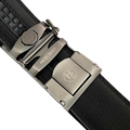 Black stitched-edge leather ratchet belt, close-up of edge stitching