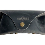 Soft Leather Eye Glasses Case in Black Washed, closed, front view showing weathered grain and embossed Hedonist logo