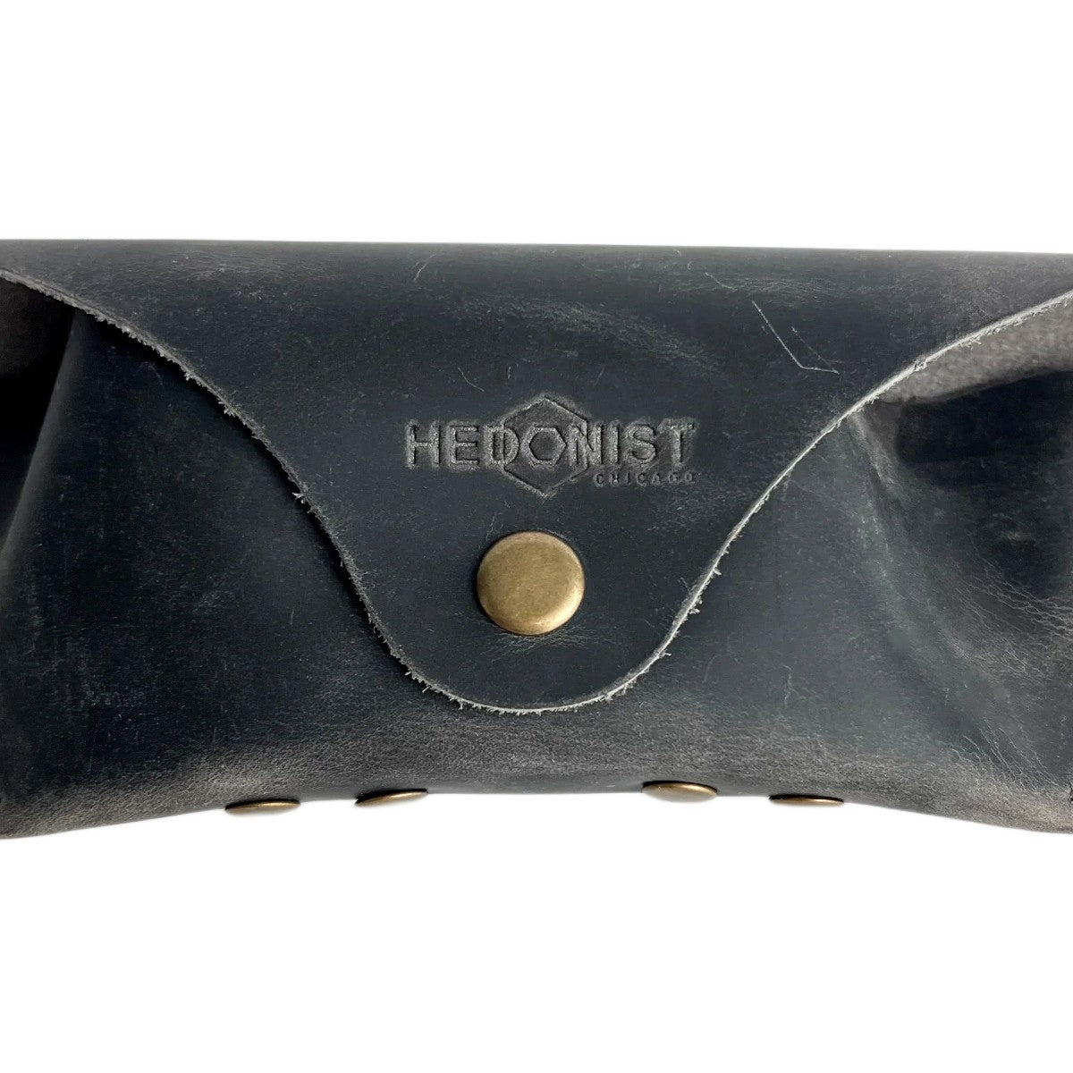 Soft Leather Eye Glasses Case in Black Washed, closed, front view showing weathered grain and embossed Hedonist logo