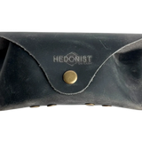 Soft Leather Eye Glasses Case in Black Washed, closed, front view showing weathered grain and embossed Hedonist logo