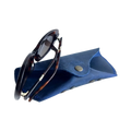 Soft Leather Eye Glasses Case in Navy Blue with tortoiseshell sunglasses resting on top
