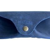 Soft Leather Eye Glasses Case in Navy Blue, closed, front view with embossed Hedonist logo and snap closure